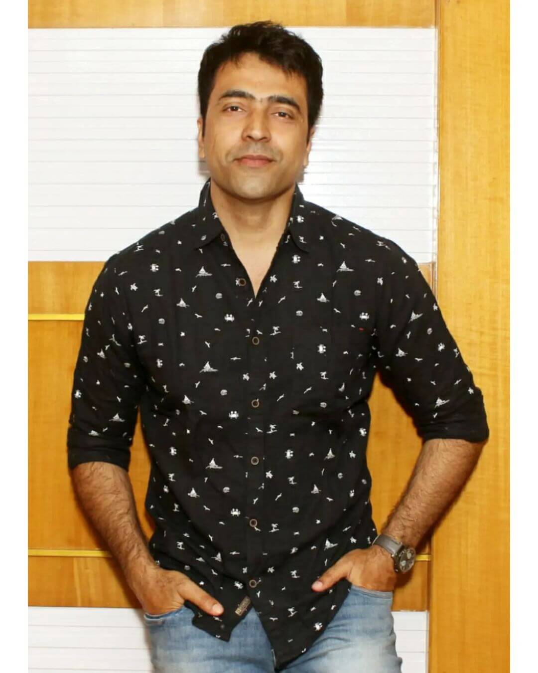 Actor Abir Chaterjee in black and white doted shirt