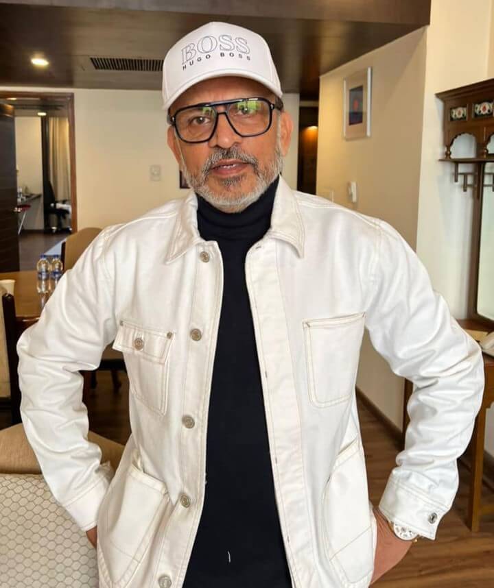 Actor Annu Kapoor in white jacket