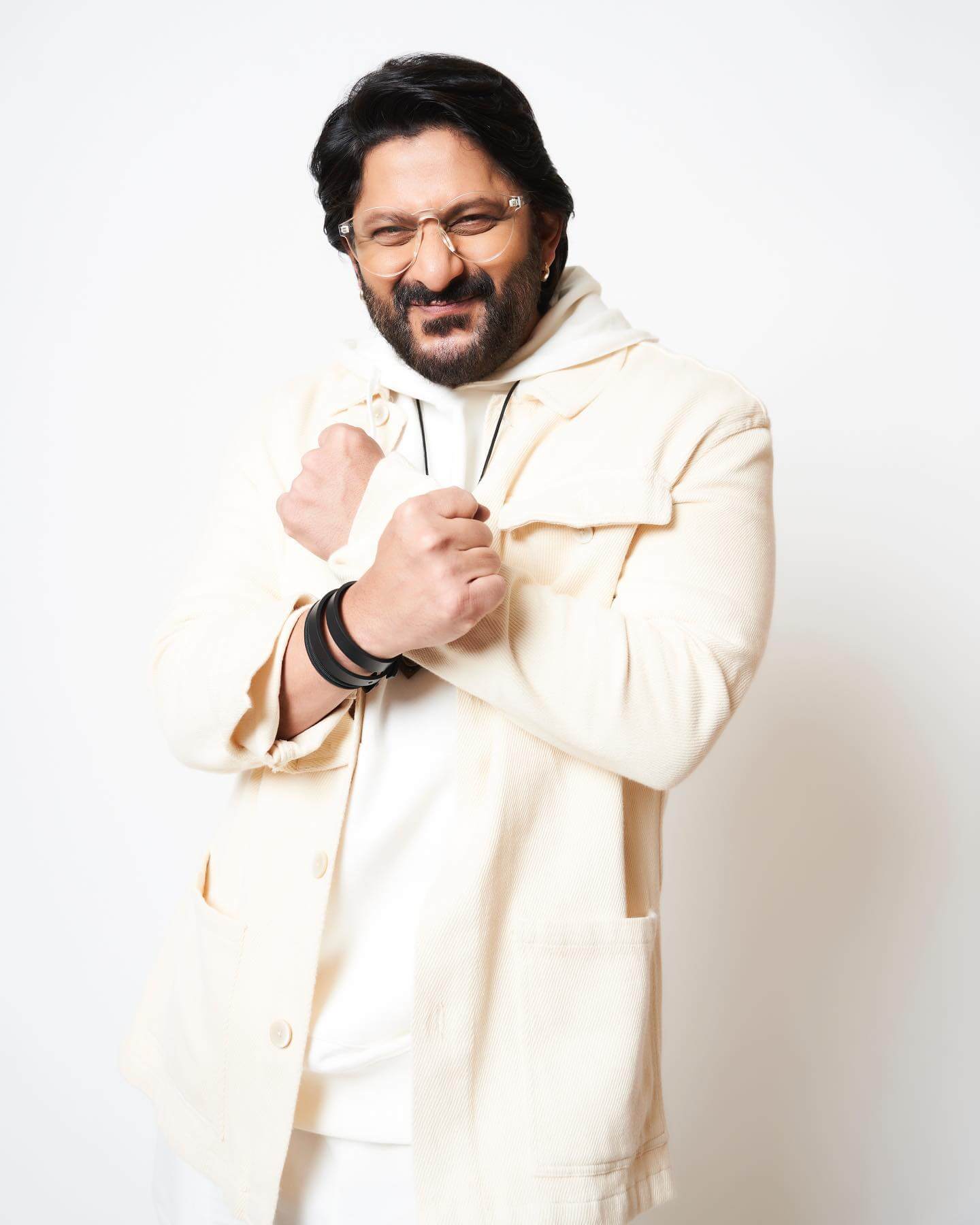 Actor Arshad Warsi in stylish white outfit