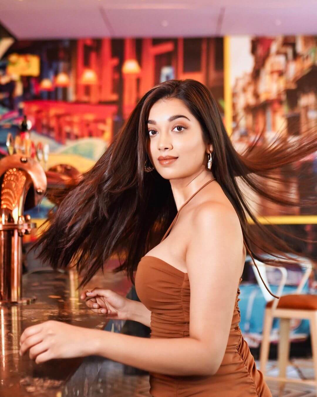 Actress Digangana Suryavanshi in sexy brown gown