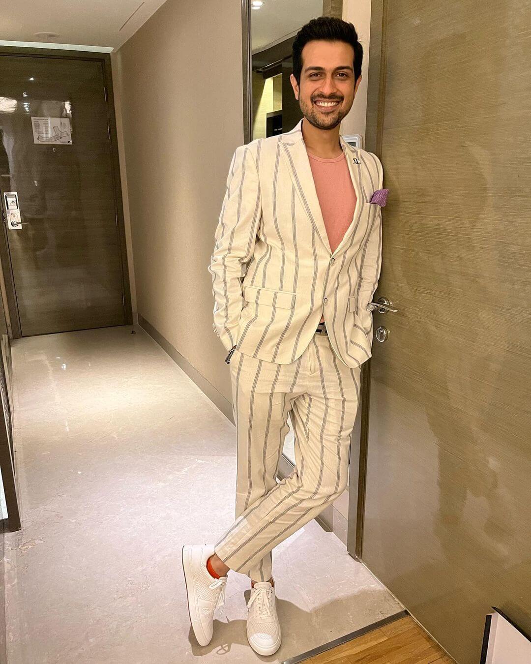 Actor Raunaq Kamdar in stylish suit