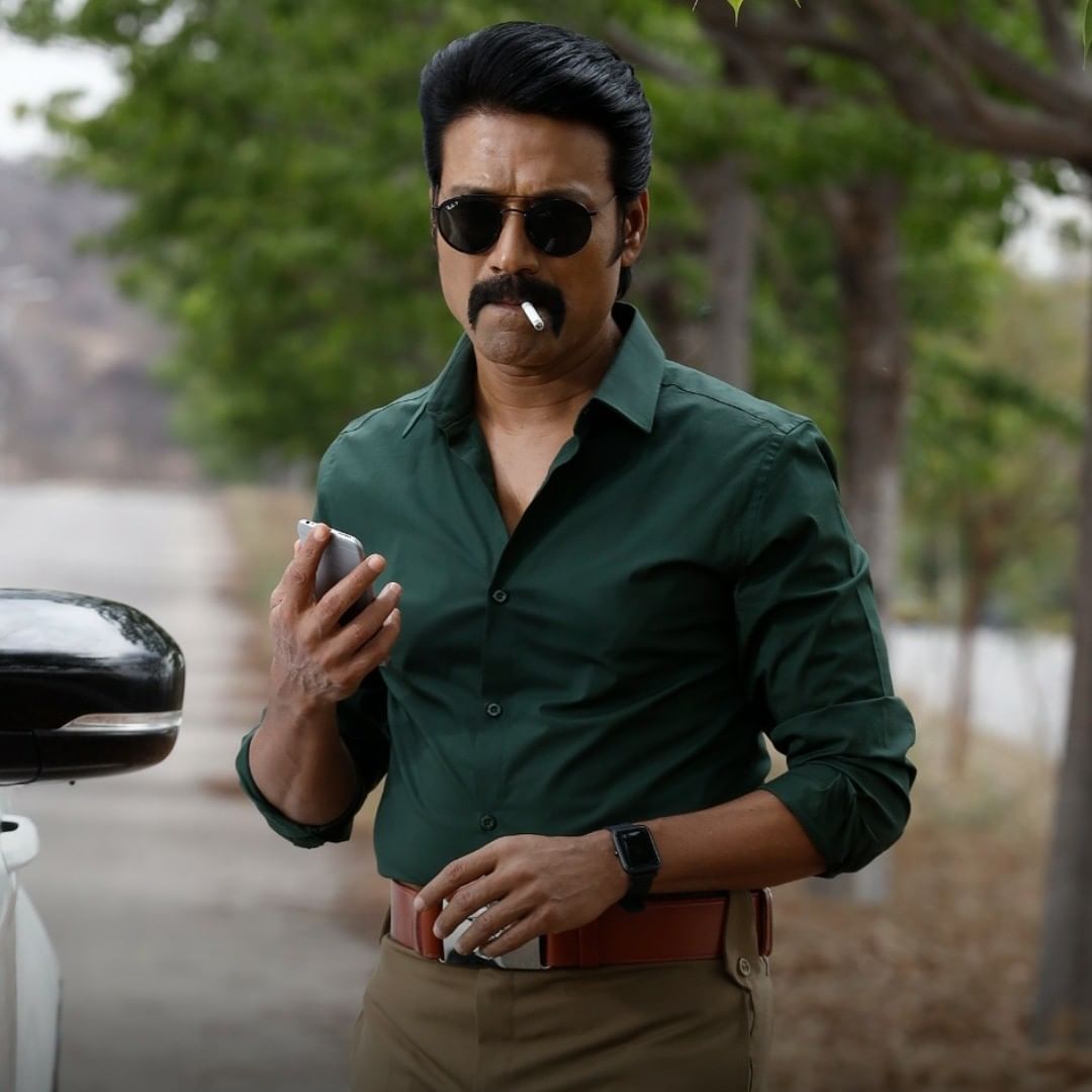 Actor S.J. Suryah stylish look in dark green shirt