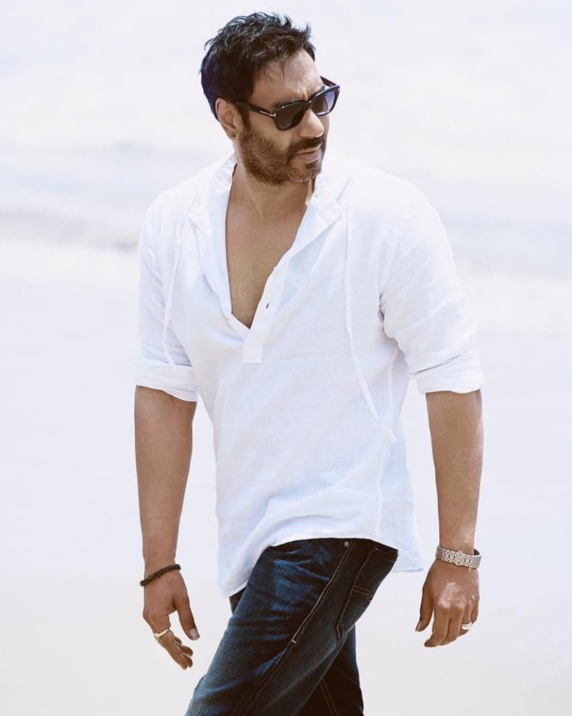 Actor Ajay Devgn in white shirt