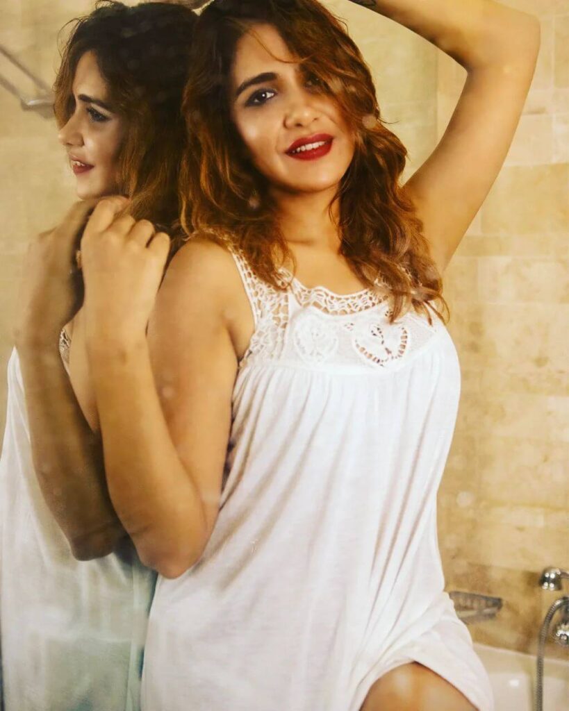 Actress Akshita Agnihotri in sexy white gown