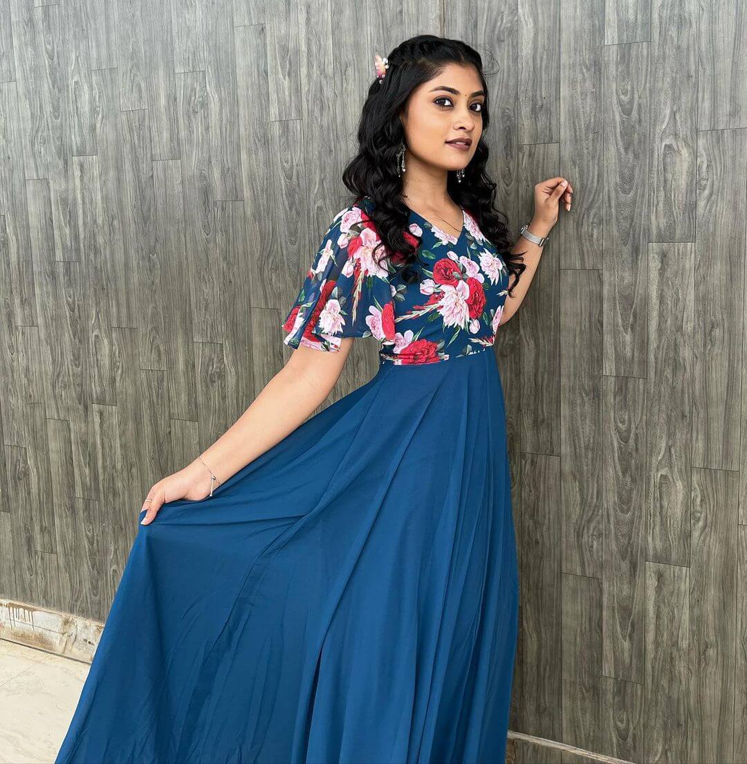 Actress Ammu Abhirami in stylish blue dress