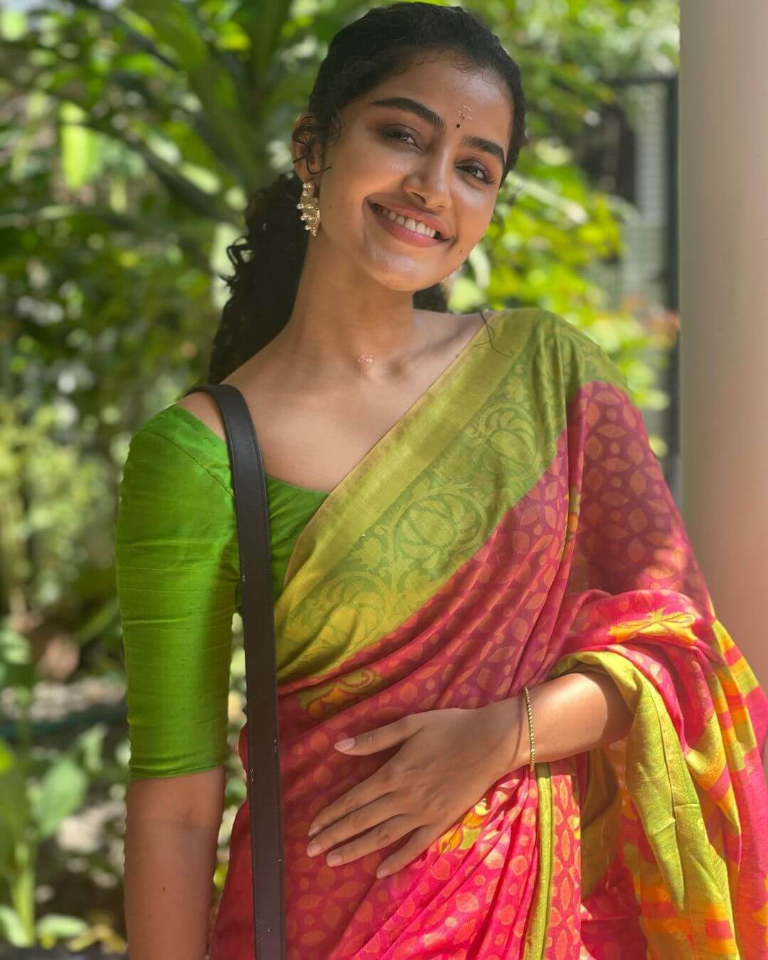 Actress Anupama Parameswaran in green and red pattern saree