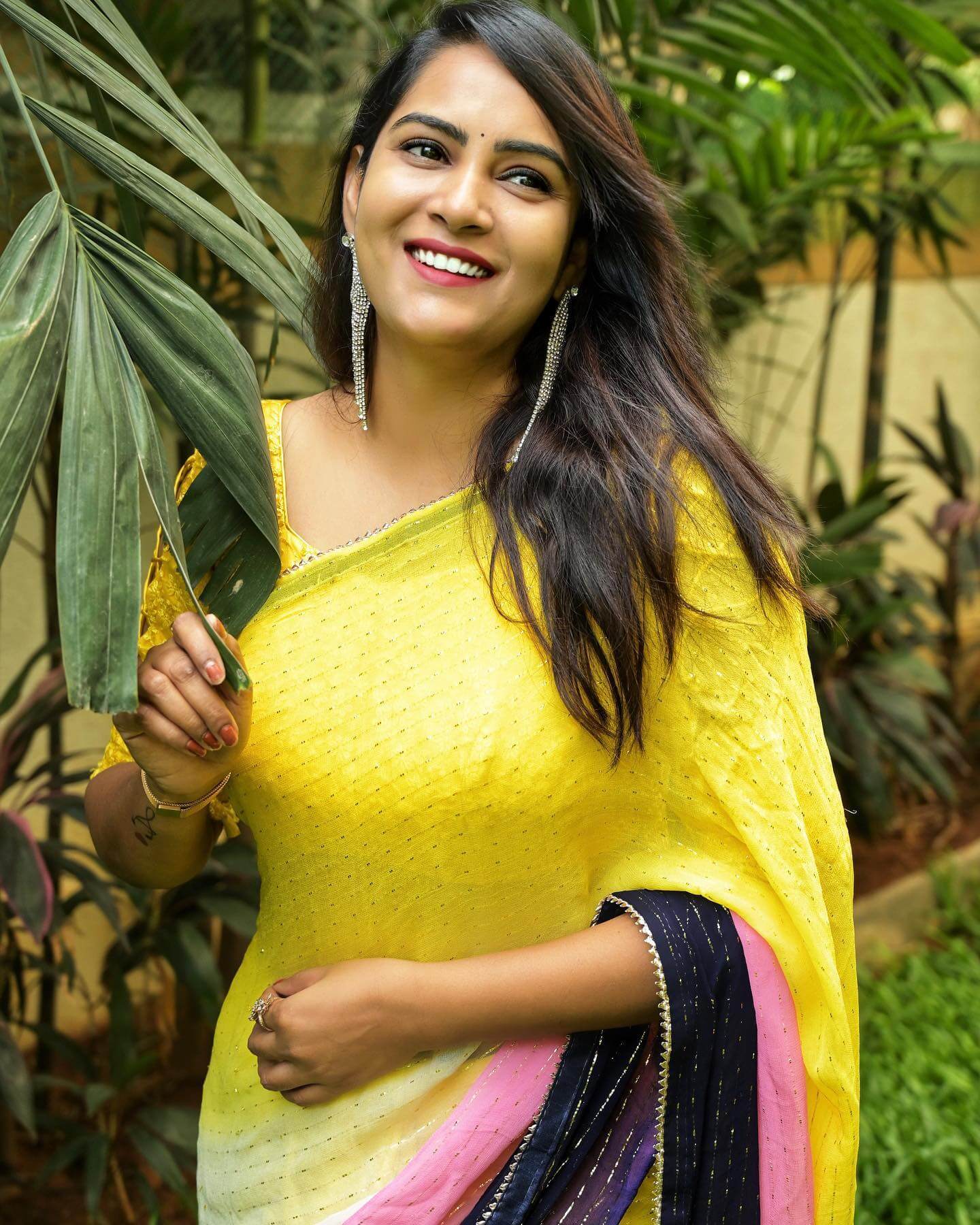 Actress Himaja in yellow and black saree