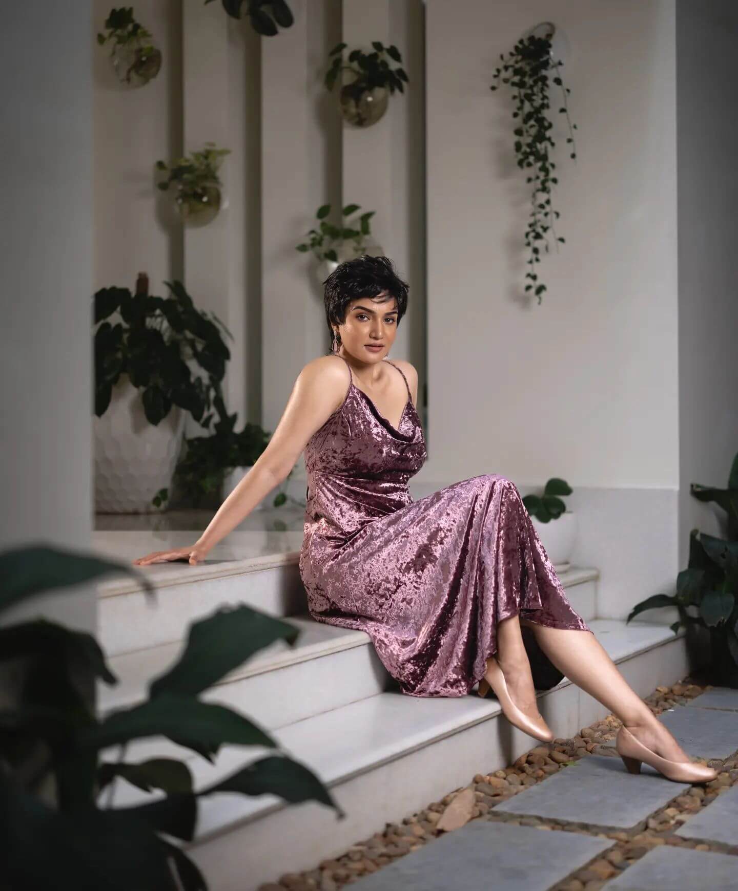 Actress Honey Rose in sexy violet sleeveless gown