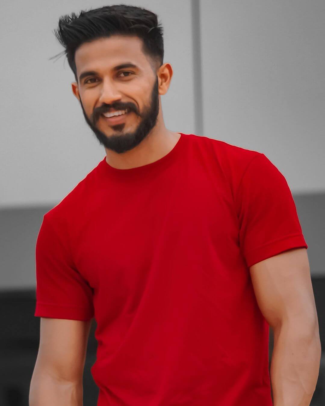 Actor Kaveesh Shetty in red tshirt