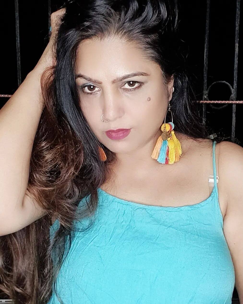 Actress Meenakshi Chugh in sky blue outfit close up shot