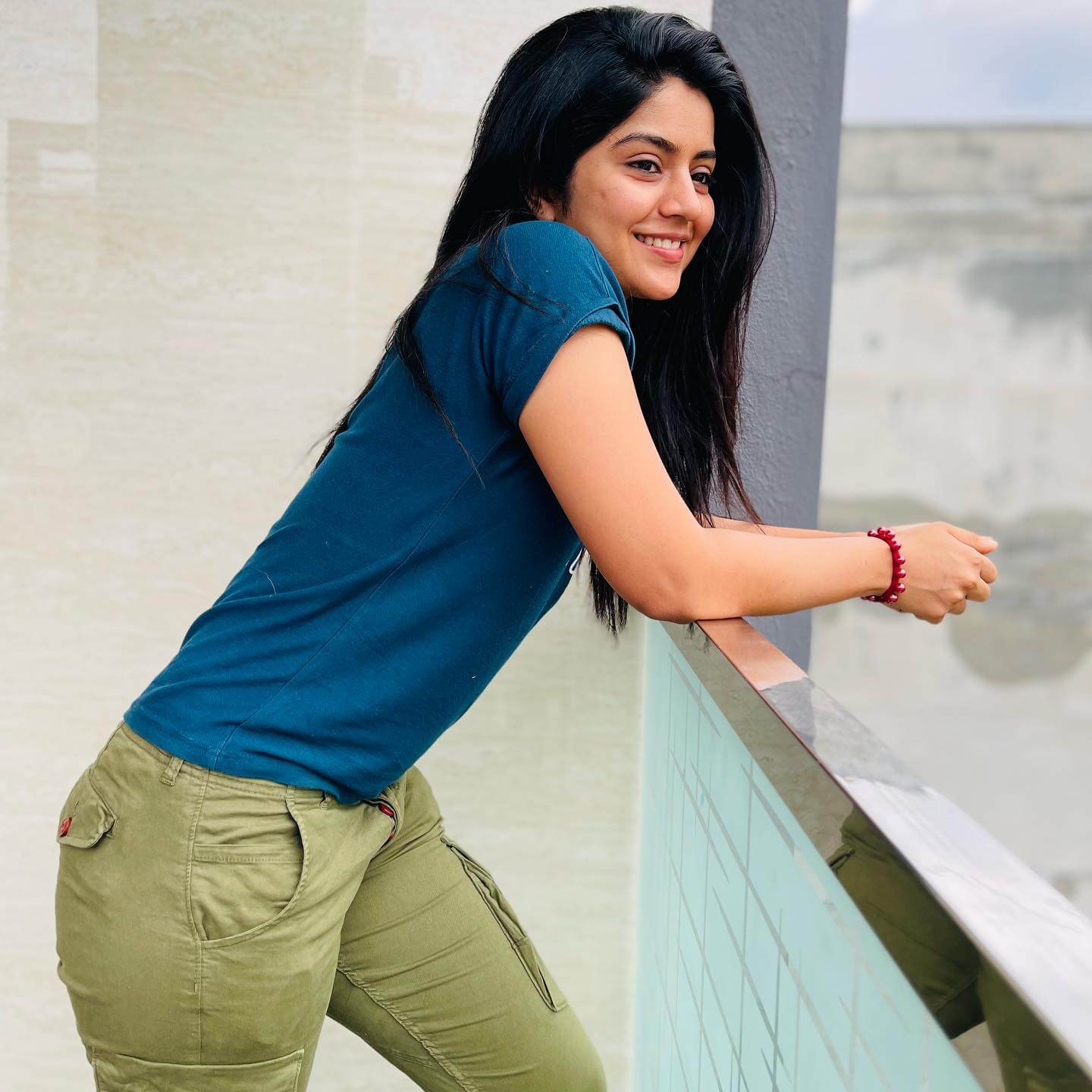 Actress Megha Shetty stylish look in dark blue tshirt