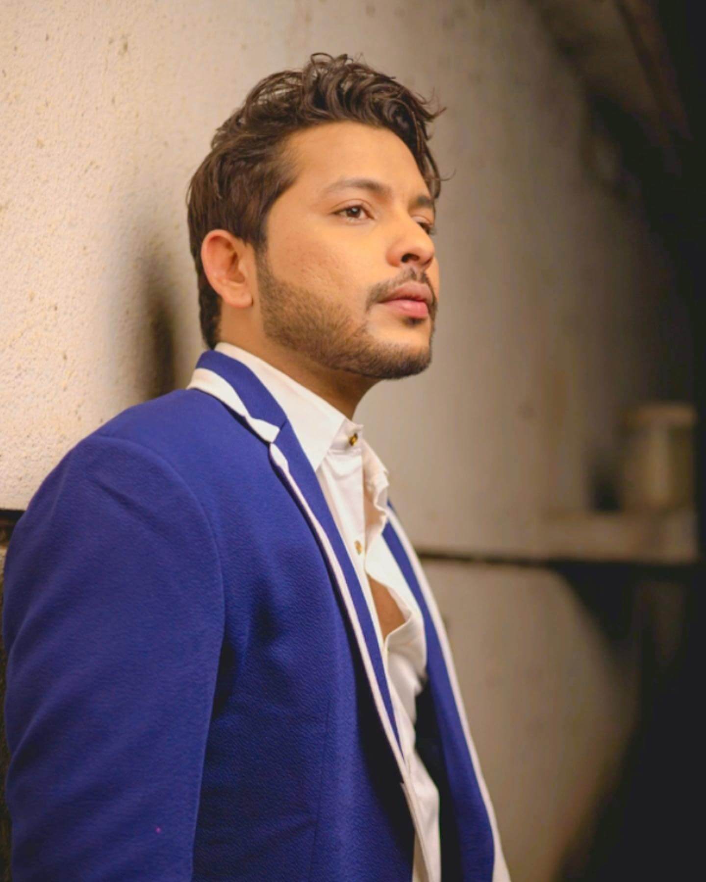 Nishant Bhat in blue jacket