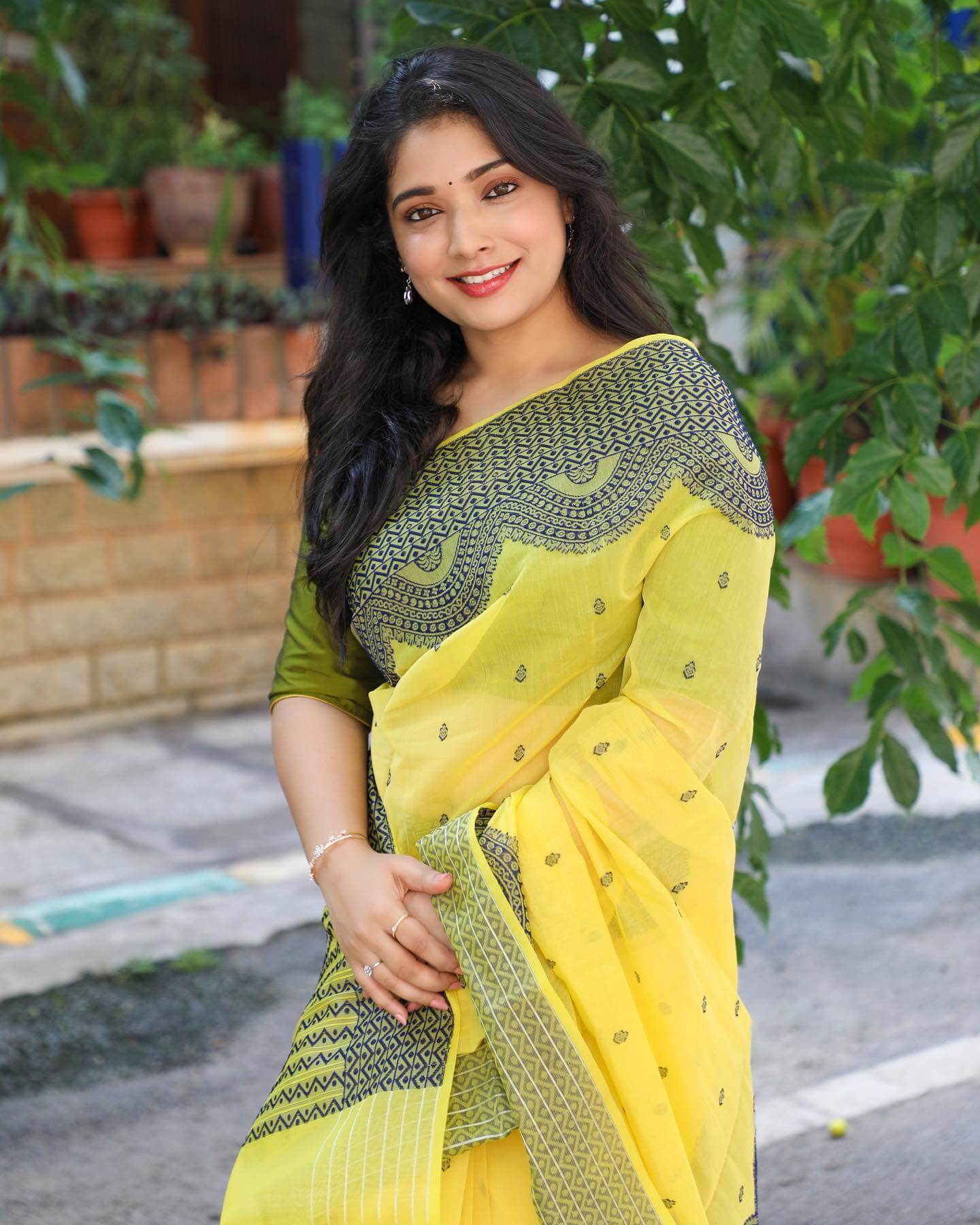 Actress Priyanka Thimmesh in yellow saree