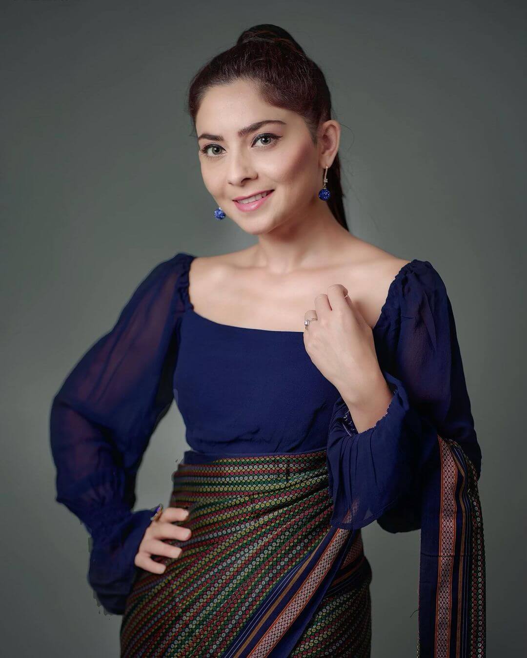 Actress Sonalee Kulkarni in dark blue outfit