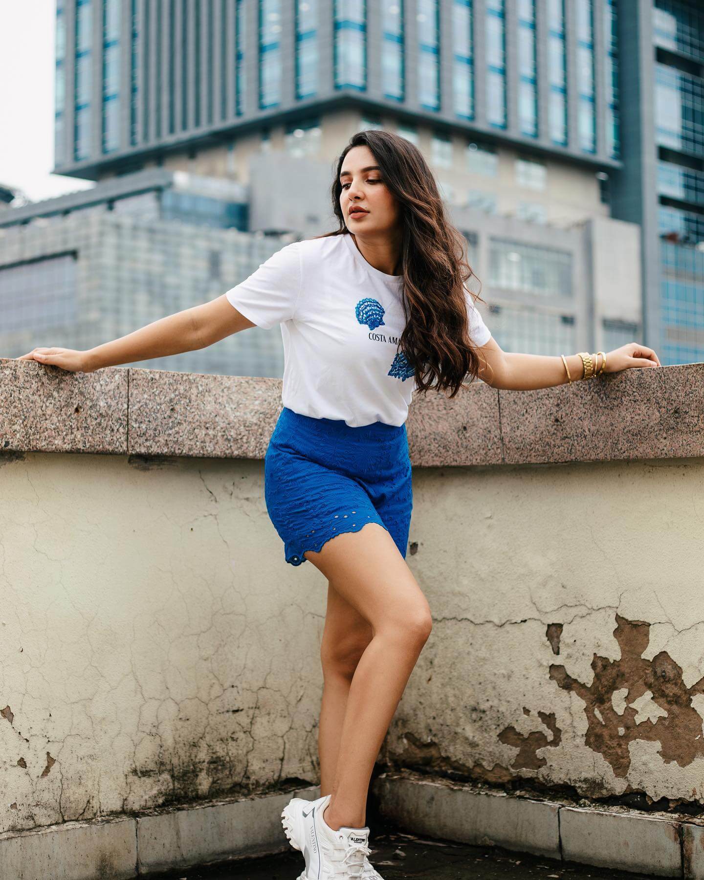 Actress Subhasree Ganguly in white tshirt and blue shorts