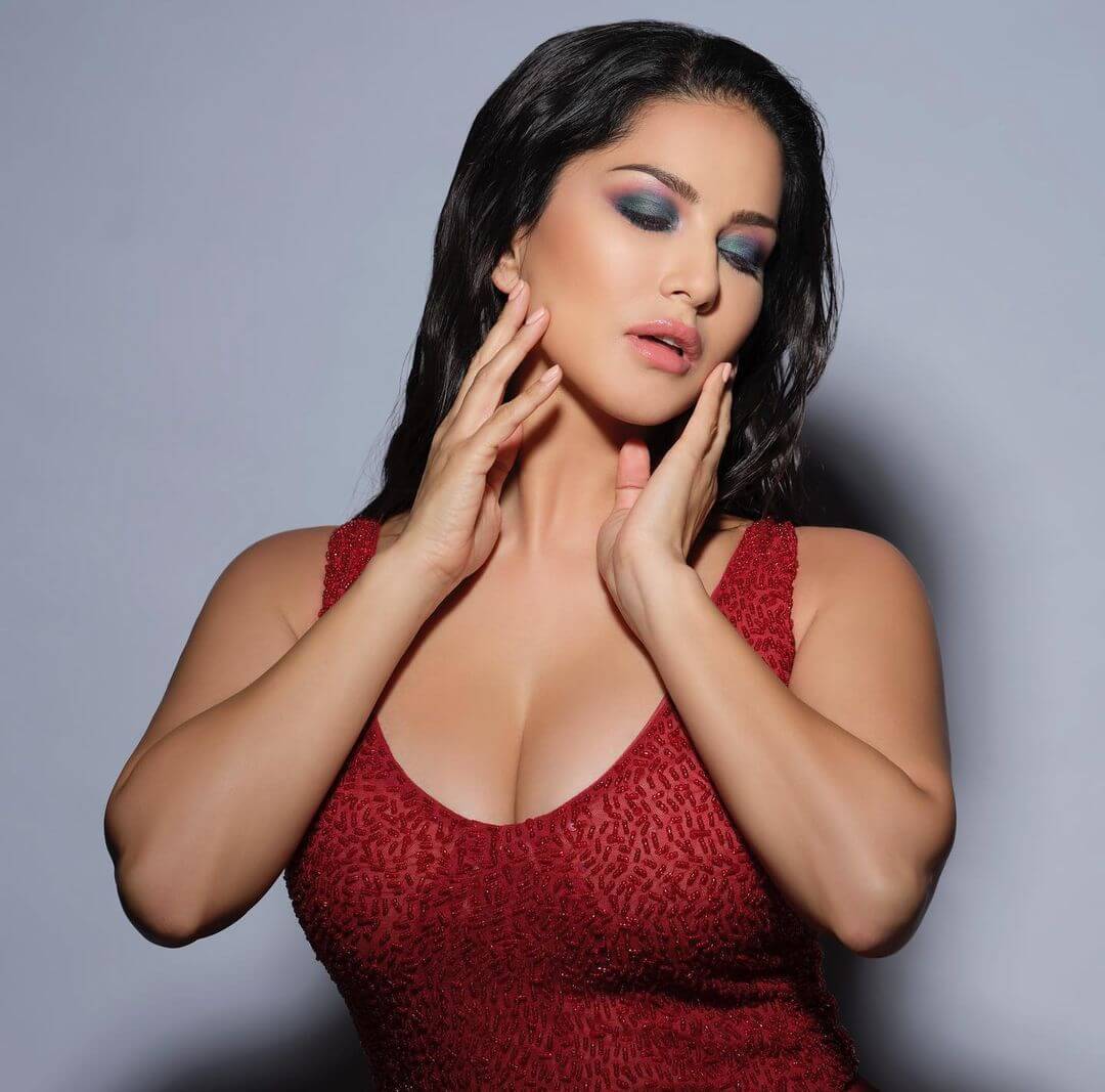 Actress Sunny Leone in red sexy top