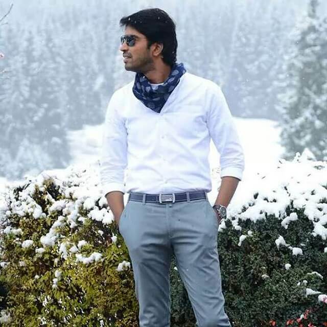 Actress Allari Naresh stylish look in white shirt and gray pants