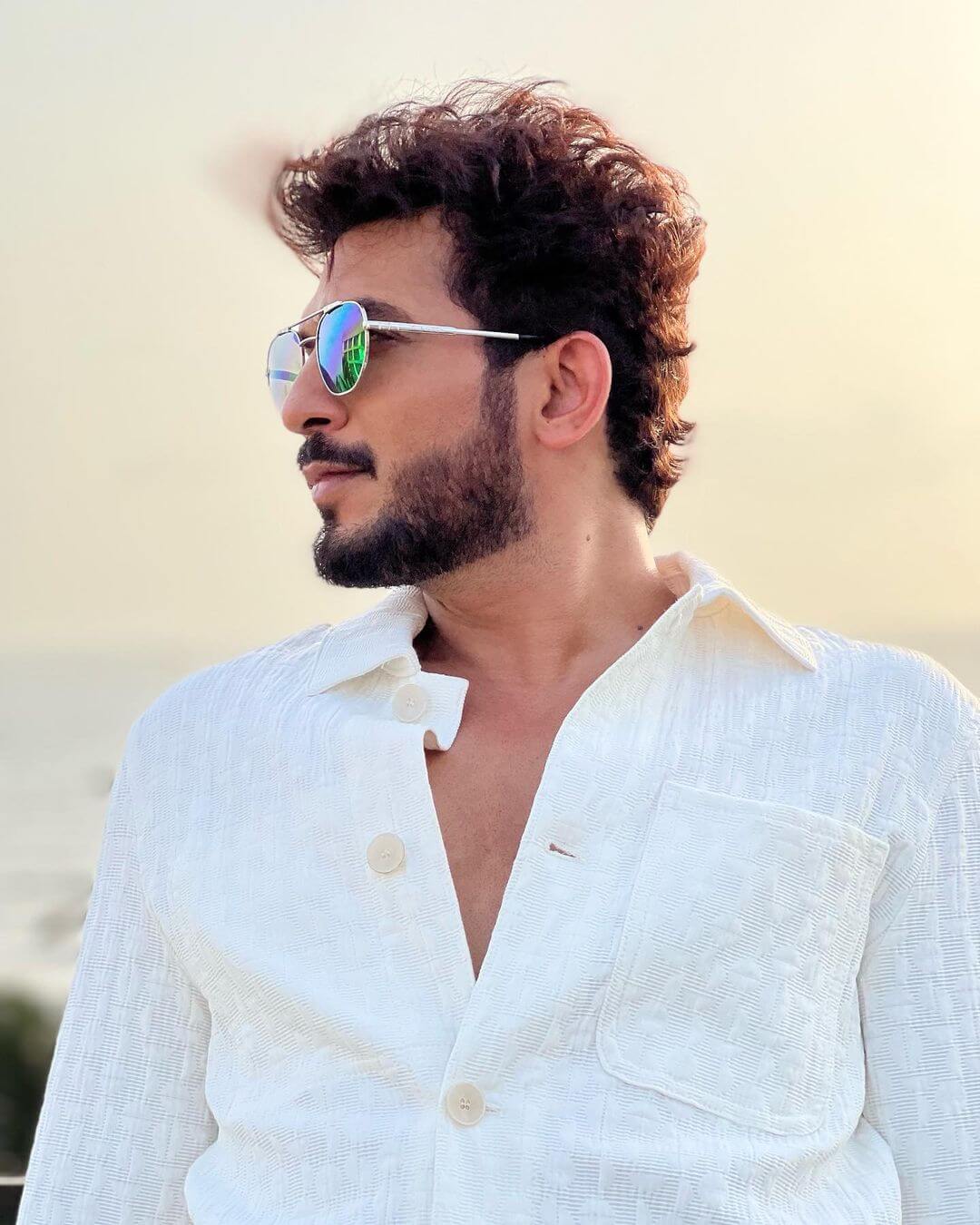 Actor Arjun Bijlani close up shot in white shirt