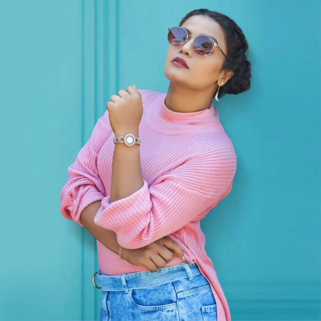 Actress Arya Salim in pink top and jeans