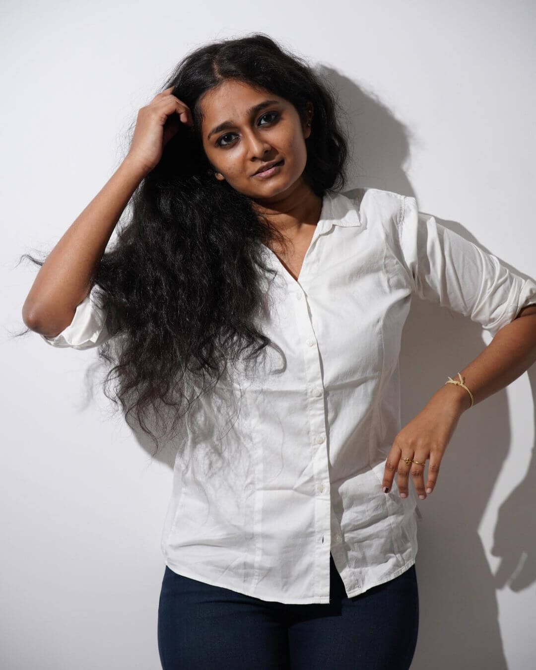 Actress Devadharshini Balamurugan in white shirt and black pant