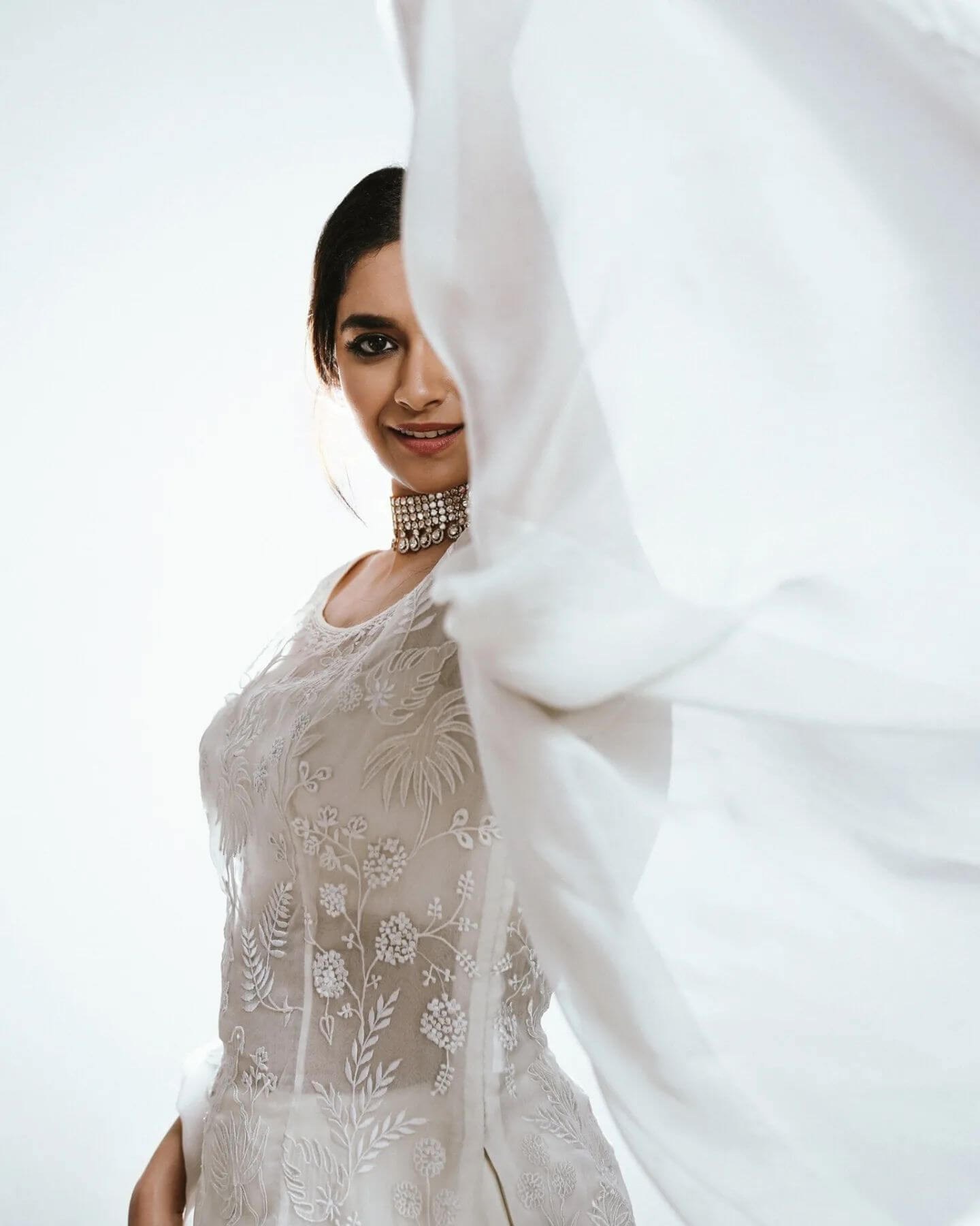 Actress Keerthy Suresh in white transparent salwar and dupatta