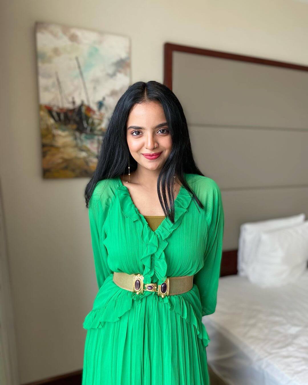 Actress Namritha MV in green outfit