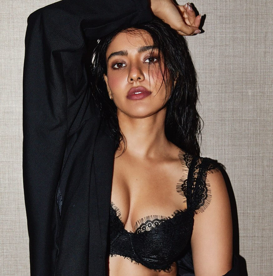 Actress Neha Sharma sexy shot in black bra