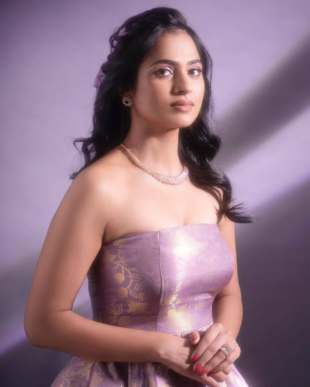 Actress Ramya Pandian close up shot in sexy pink gown