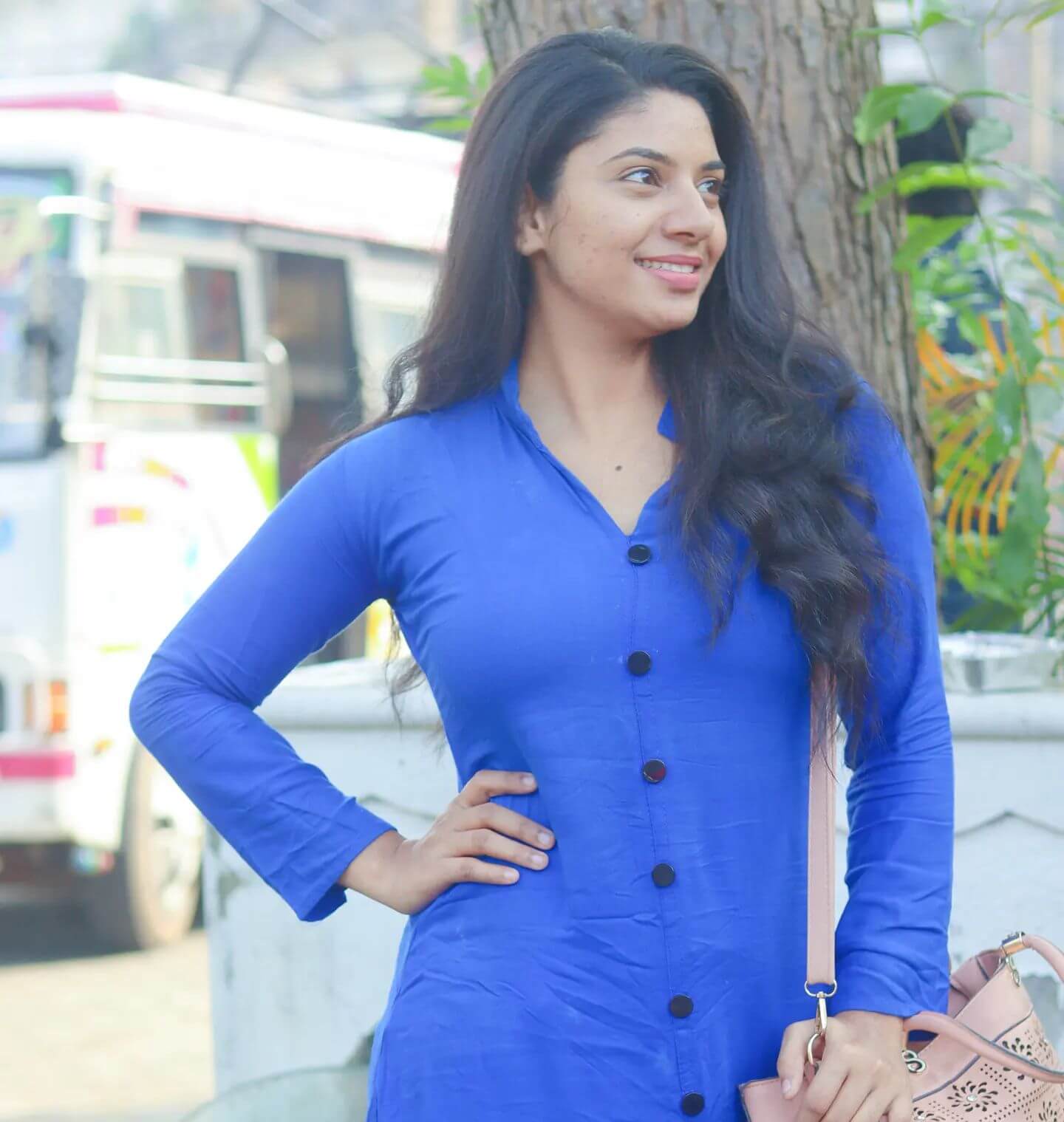 Actress Reneesha Rahiman in blue shirt