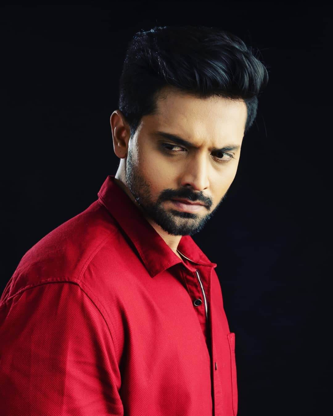 Actor Rohit Rangaswamy close up shot in red shirt