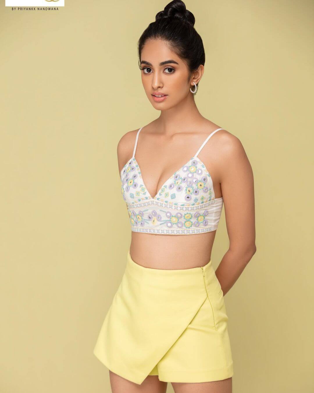 Sini Shetty in sexy tank to and yellow short skirt