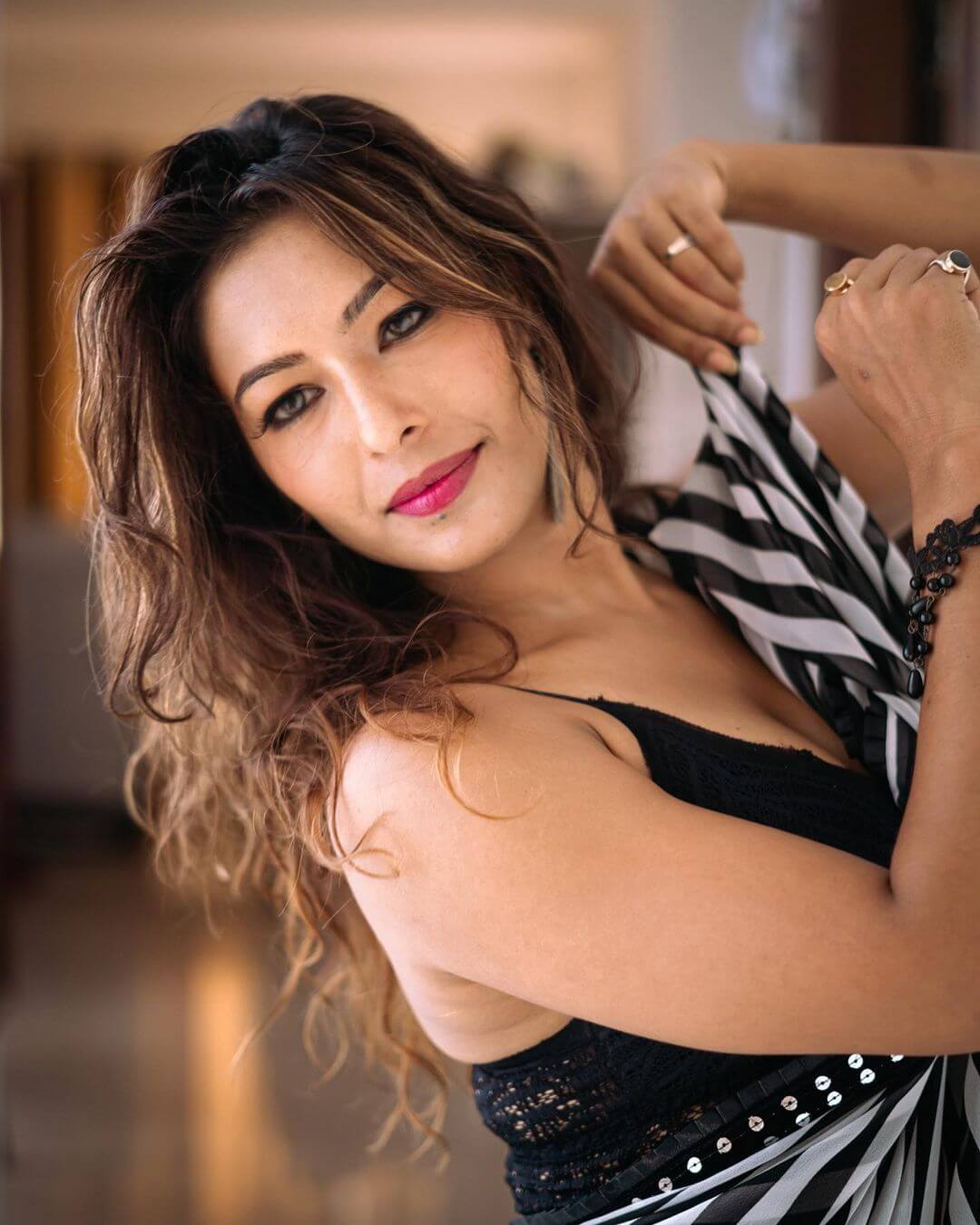 Actress Ankita Bhattacharya close up black sleeveless blouse