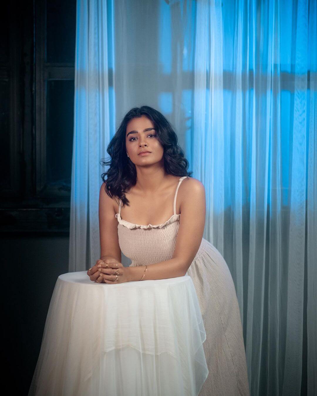 Actress Gayathrie Shankar in sleveeless white gown