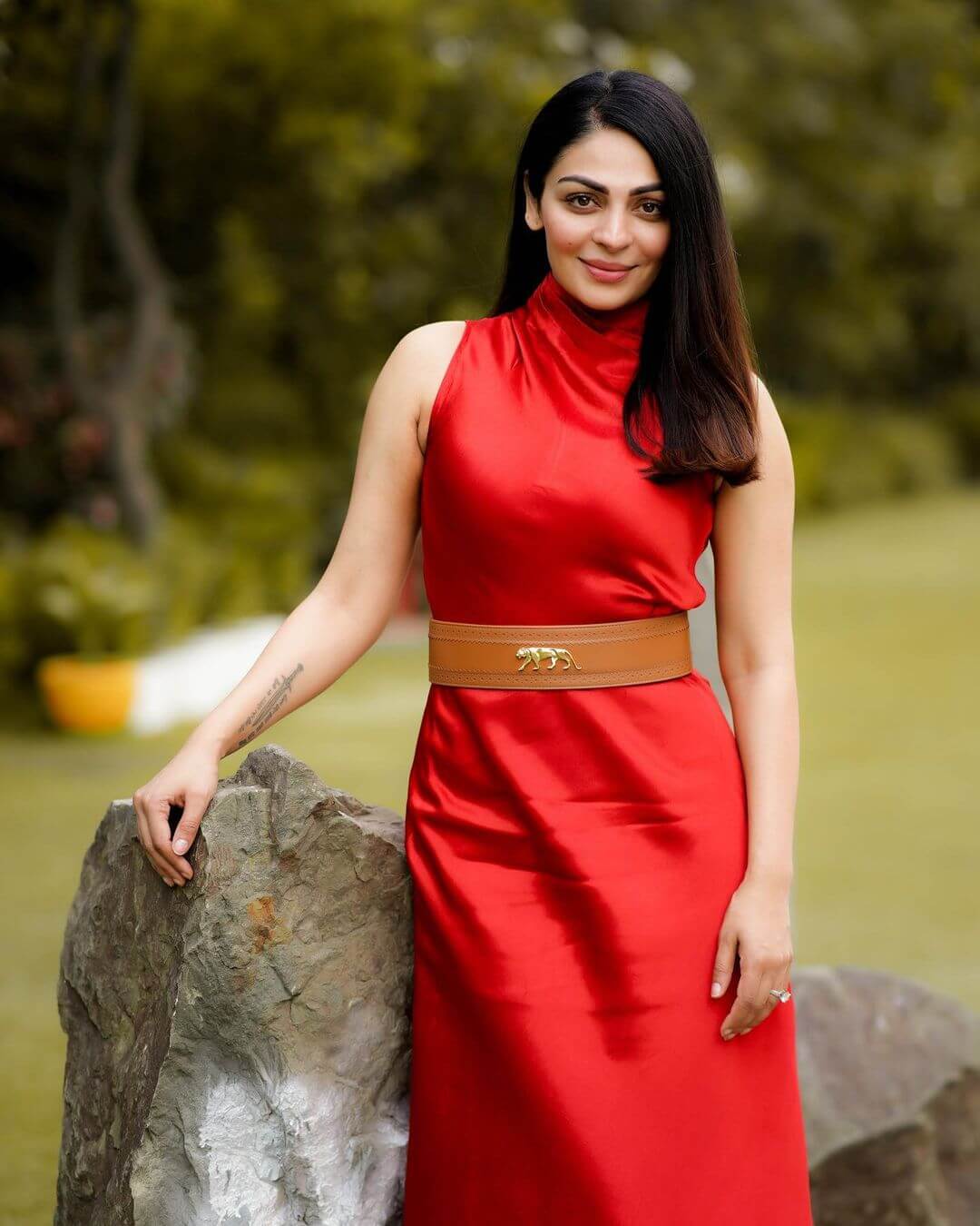 Actress Neeru Bajwa in red sleeveless gown