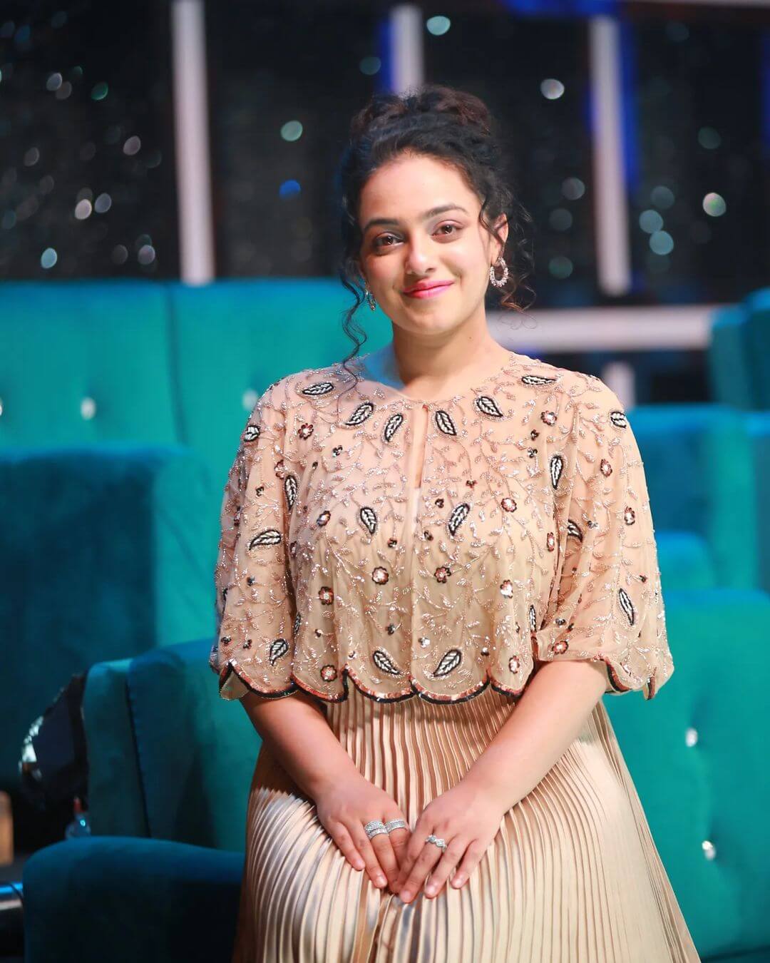Actress Nithya Menen close up in stylish outfit