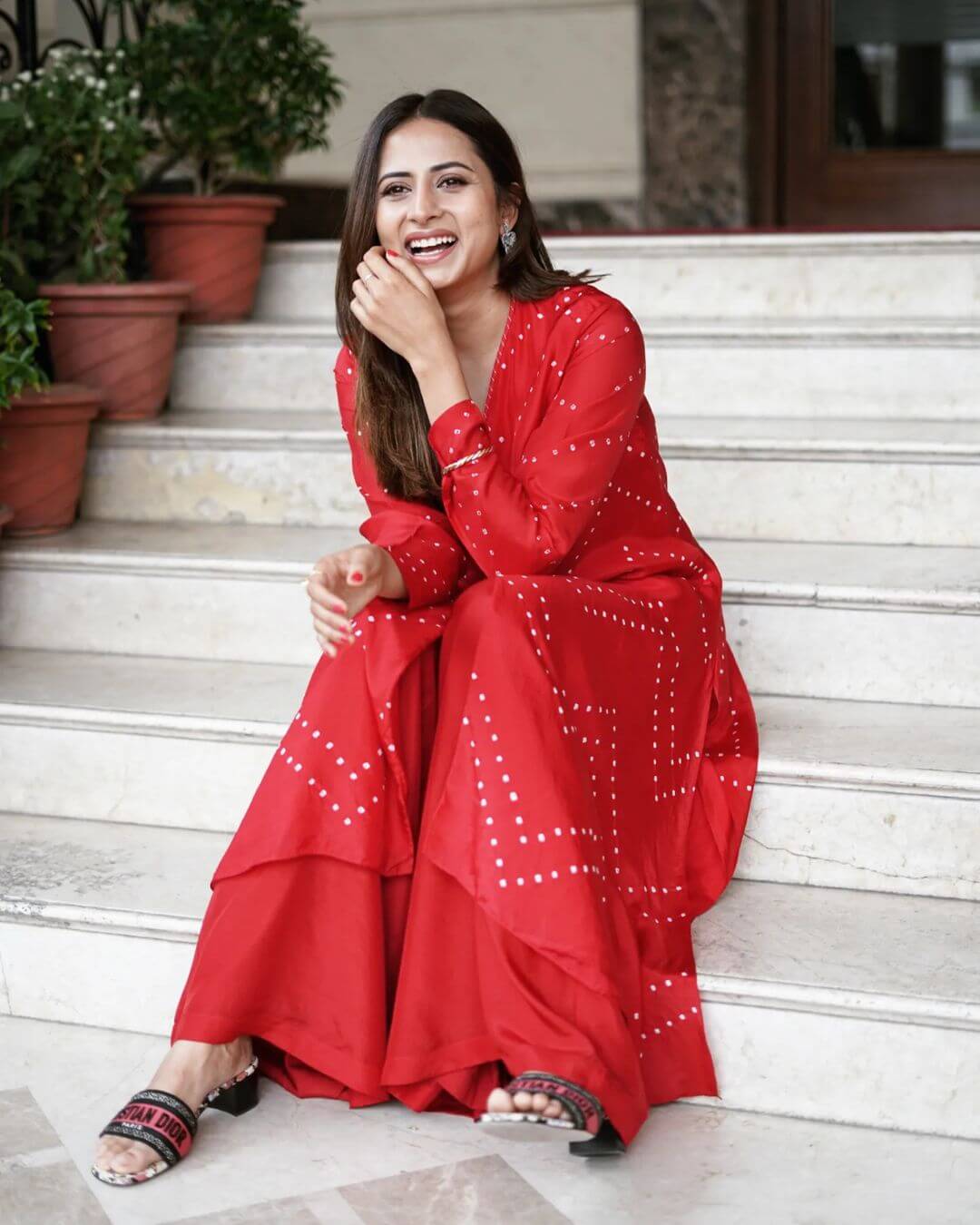 Actress Sargun Mehta red outfit