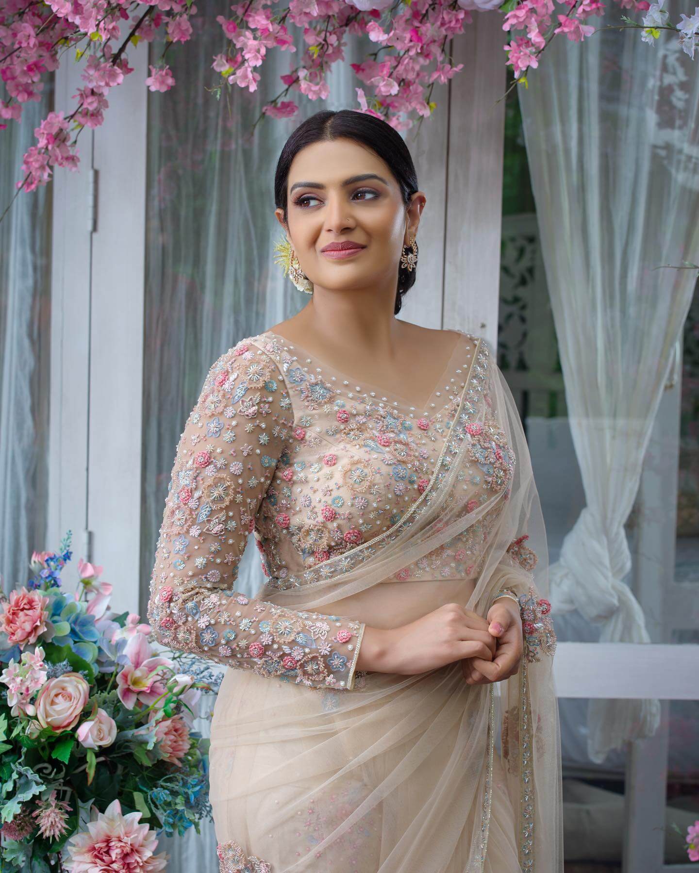 Actress Divya Pillai in stylish wedding saree