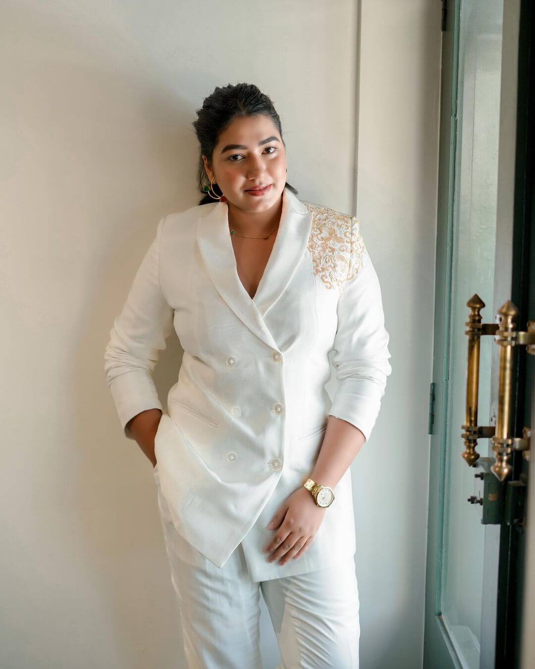 Actress Grace Antony in white outfit