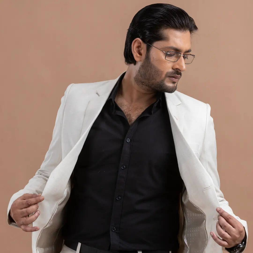 Actor stylish look in white jacket and black shirt