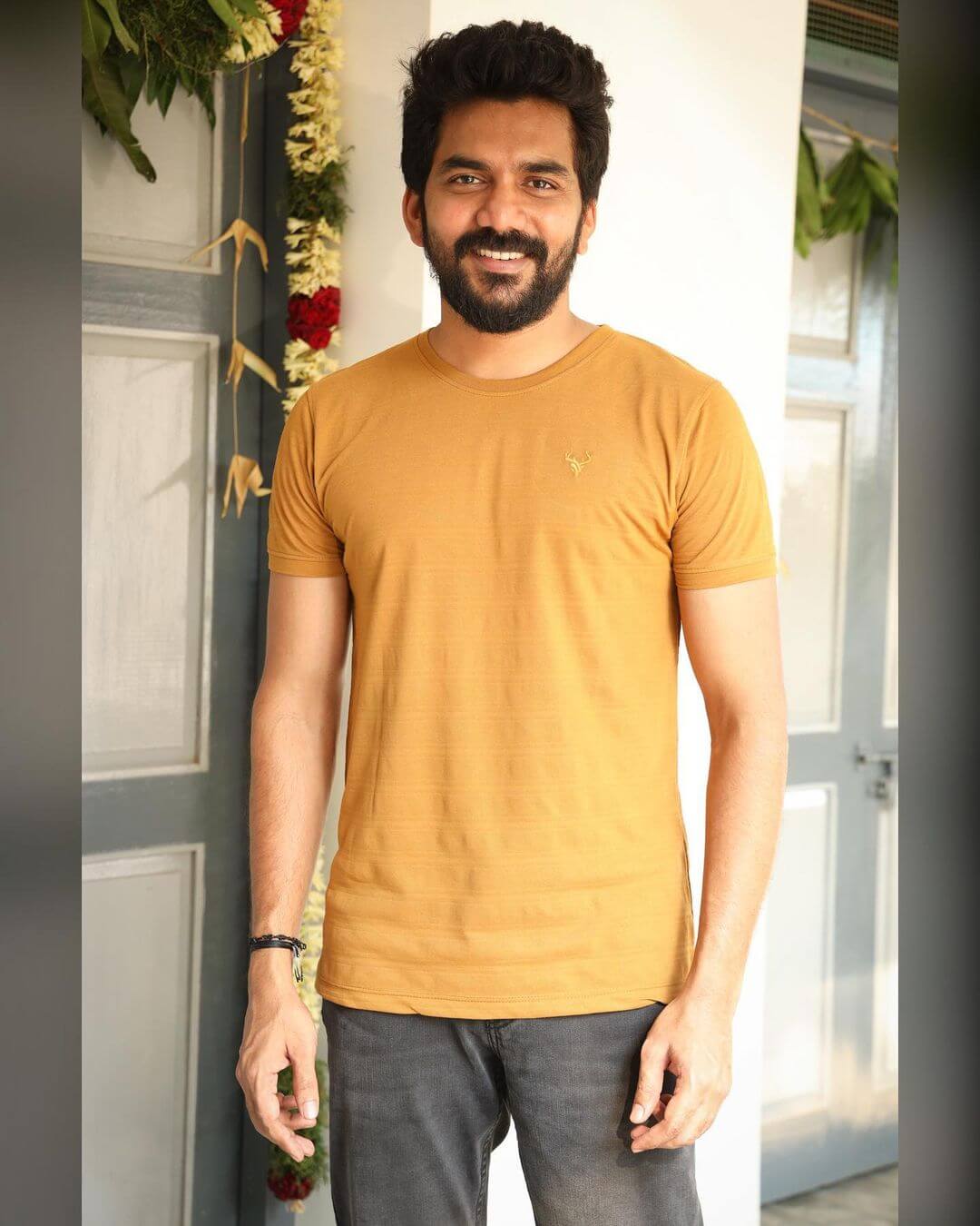 Actor Kavin close up in yellow tshirt
