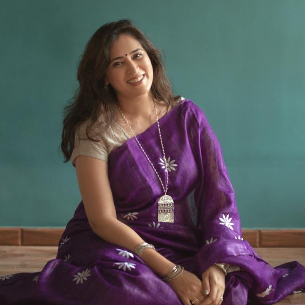 Actress Mugdha Godbole in violet color saree