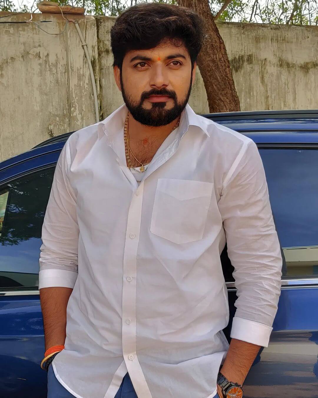 Actor Satwik Chowdary in white shirt