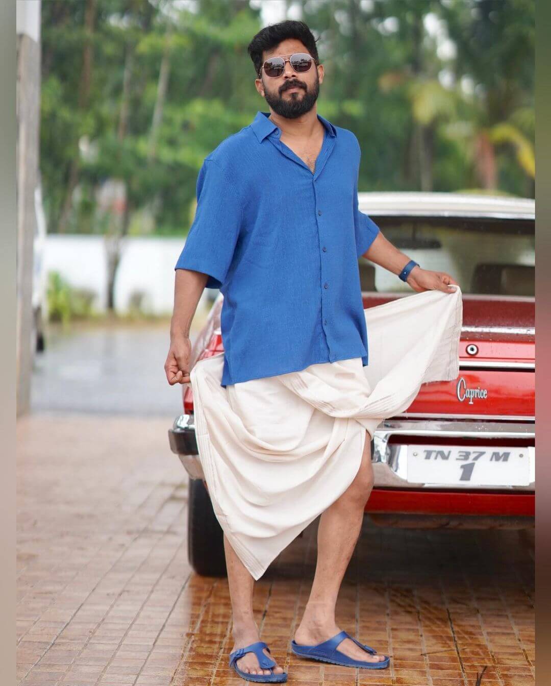 Actor Sharaf U Dheen stylish shot in blue shirt