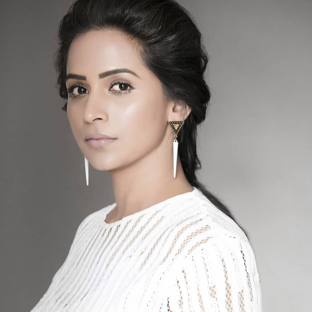 Actress Veena Jamkar close up in white top