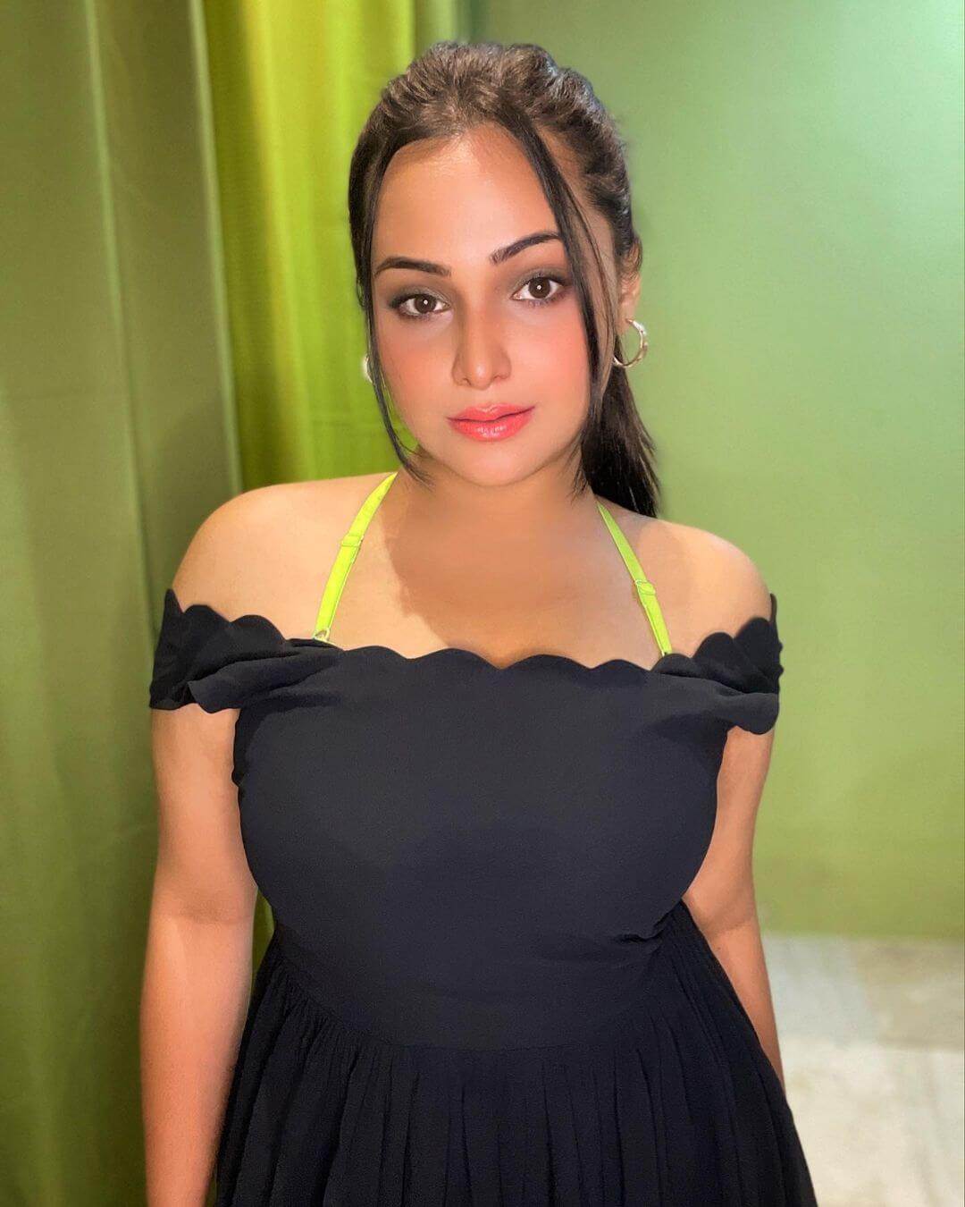 Actress Aliya Naaz close up in black outfit