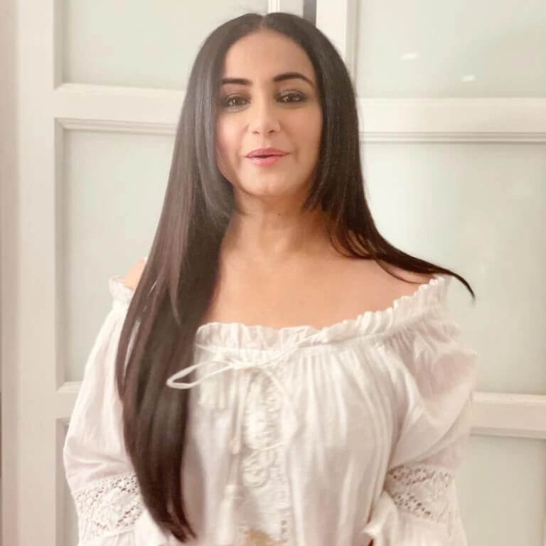 Actress Divya Dutta close up in sexy white outfit