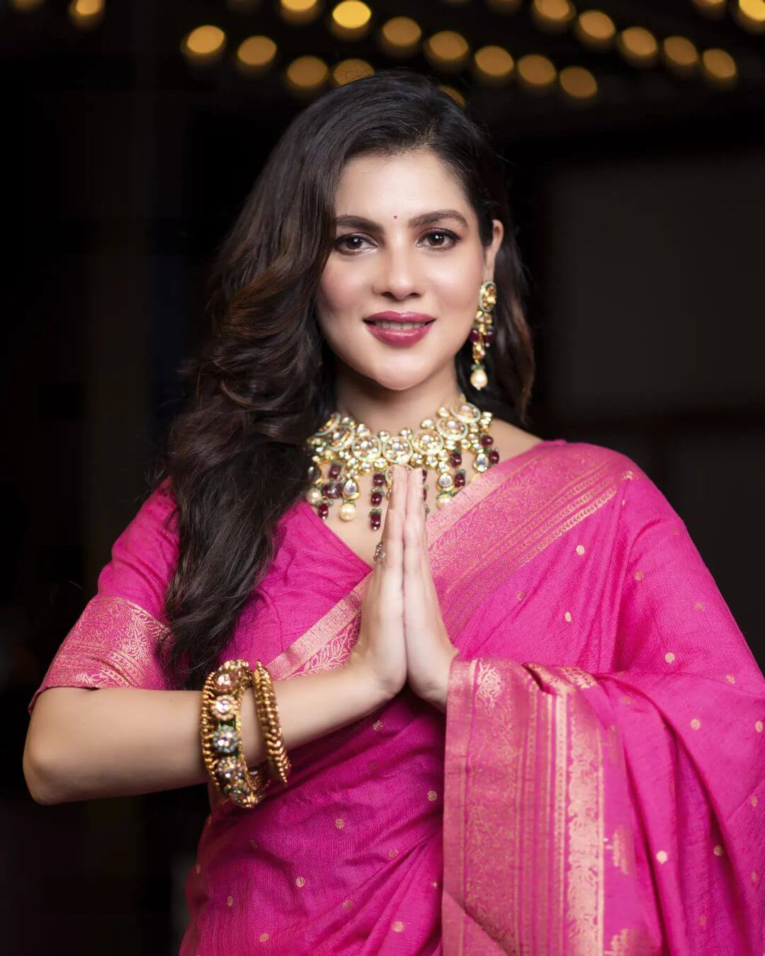 Actress Paayel Sarkar close up in pink saree