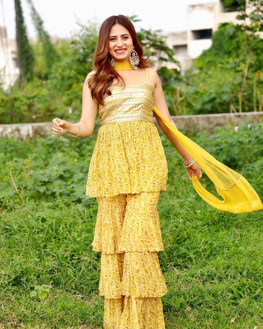 Actress Sargun Mehta in yellow outfit