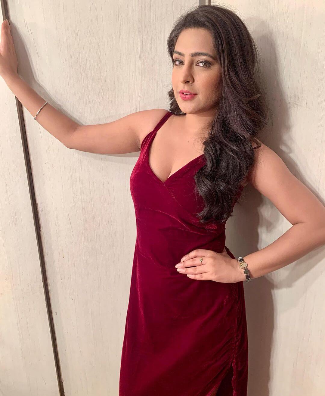 Actress Shiny Dixit in sexy wine red gown