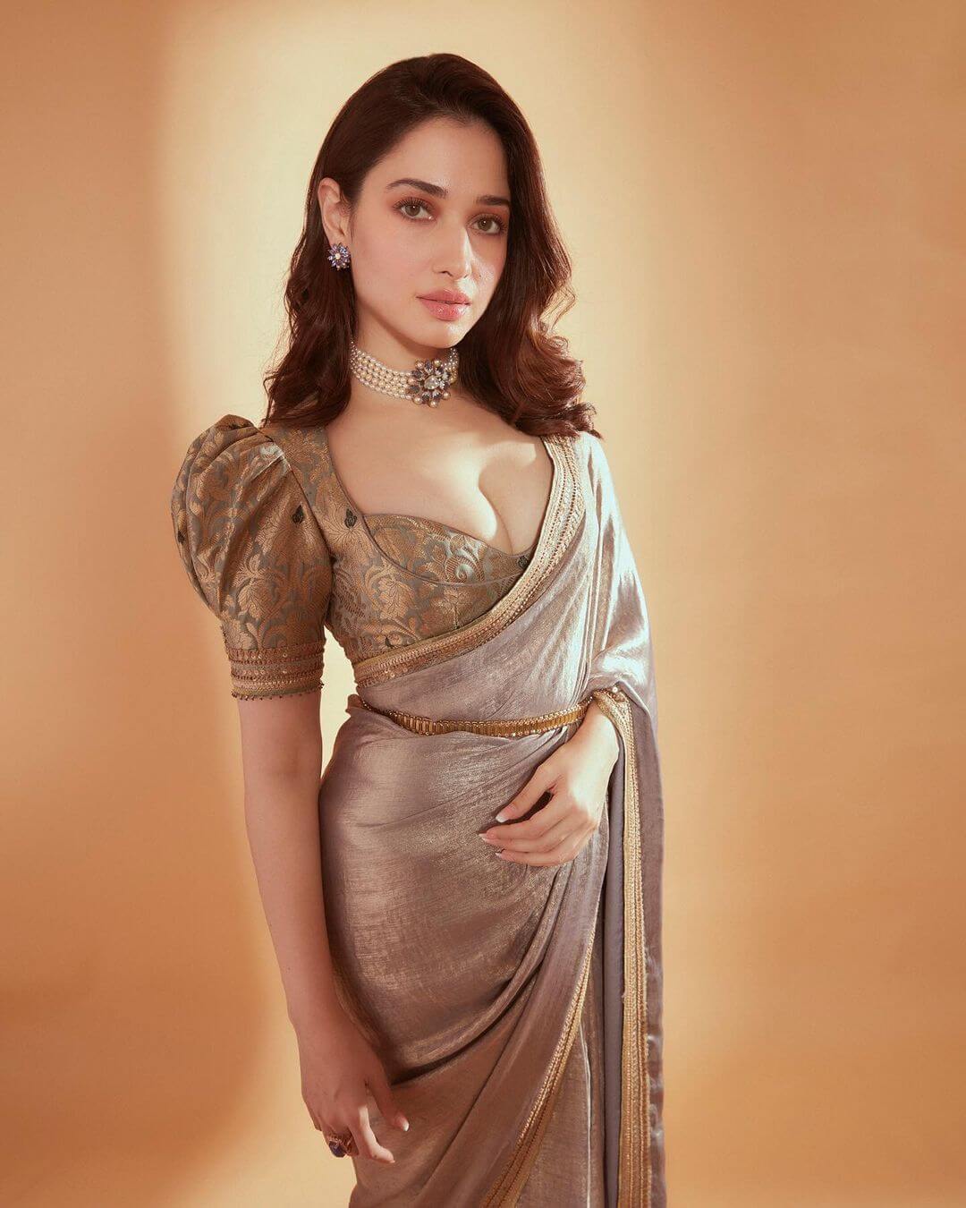 Actress Tamannaah Bhatia in stylish golden color saree